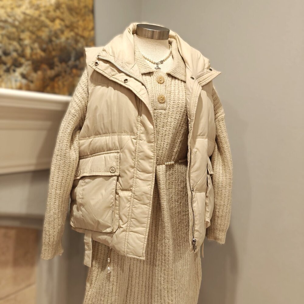 Oversized knit sweater dress in a neutral beige tone